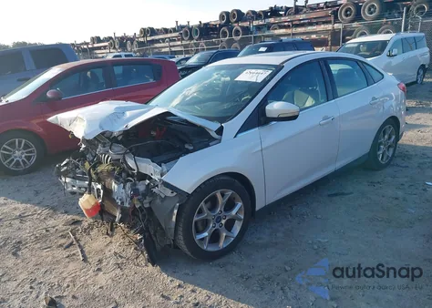 2014 Ford Focus Titanium from USA, damaged, VIN 1FADP3J27EL221699